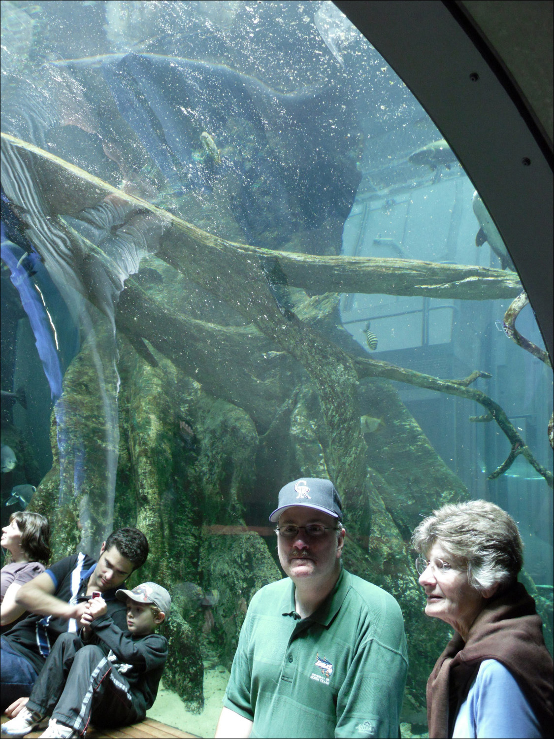 David Burrall and Anne McCarthy sitting in underwater tunnel